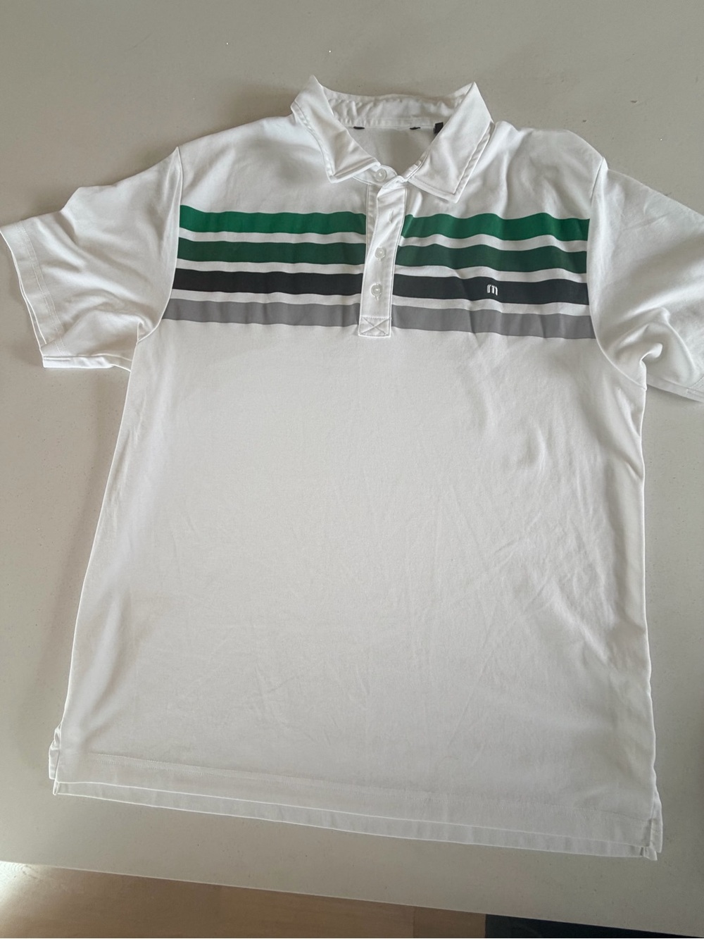 Travis Mathew White Polo with Green and Gray Chest Stripes